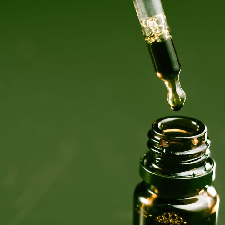 a dropper containing liquid THC