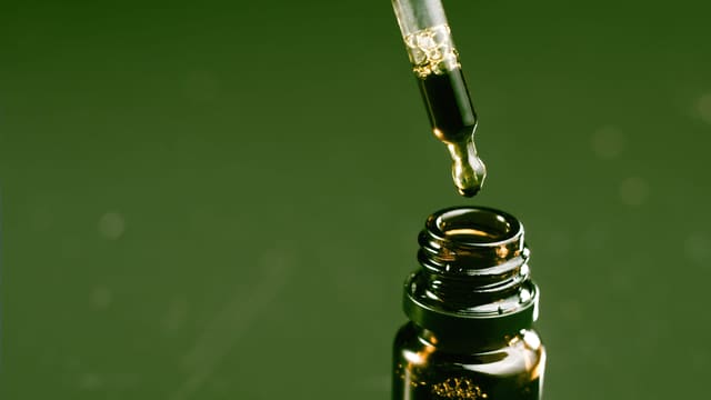 a dropper containing liquid THC